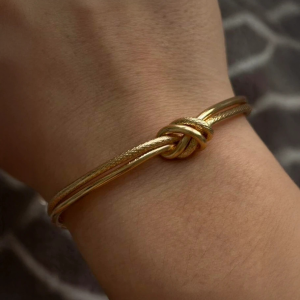 Gold Tone Textured Knot Cuff Bracelet - Image 2