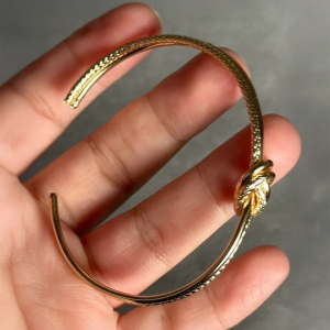 Gold Tone Textured Knot Cuff Bracelet - Image 3